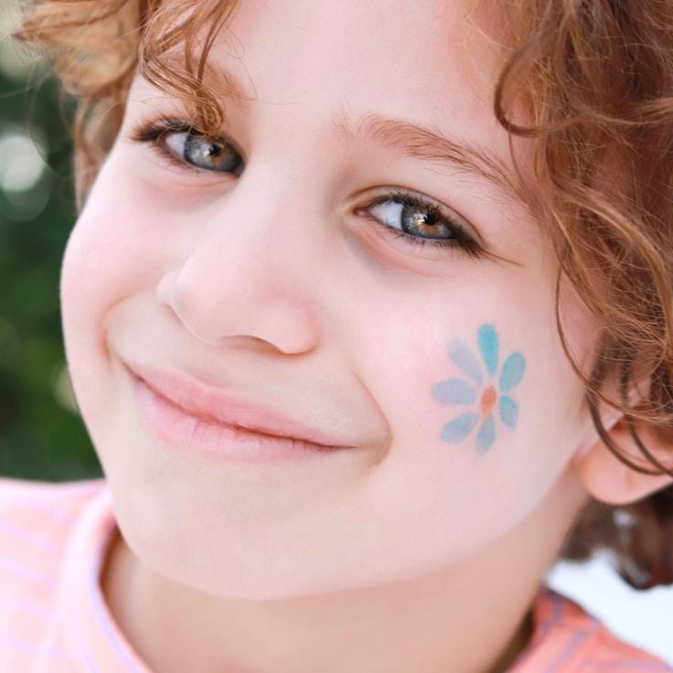 Anya Rao, Lead Design Curator at Tone Meadow Vivid, reviewing corporate floral arrangements